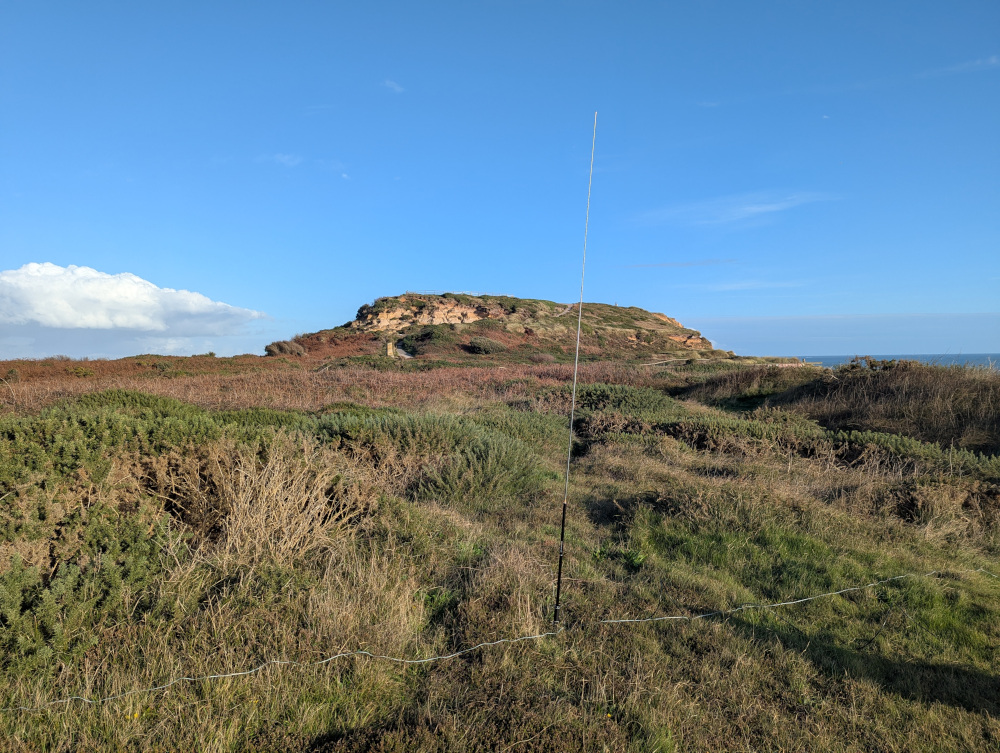 Antenna in the foreground, Hengistbury Head in the background