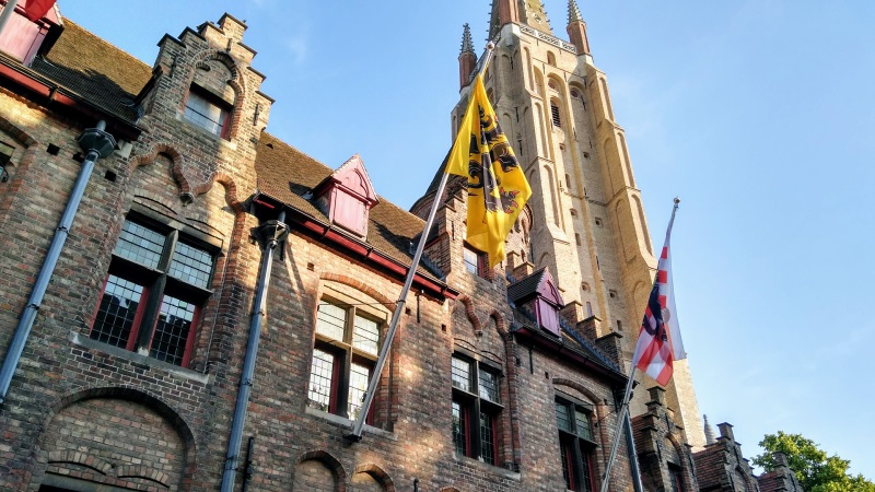 Flags flying in front of the Church of Our Lady