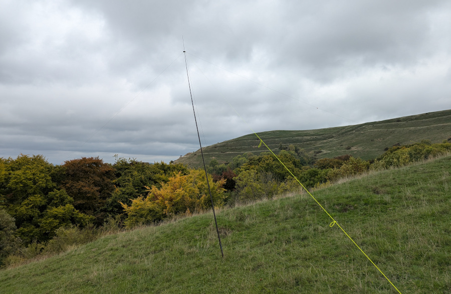 HF dipole antenna on a steep slope with Hambledon Hill in the background
