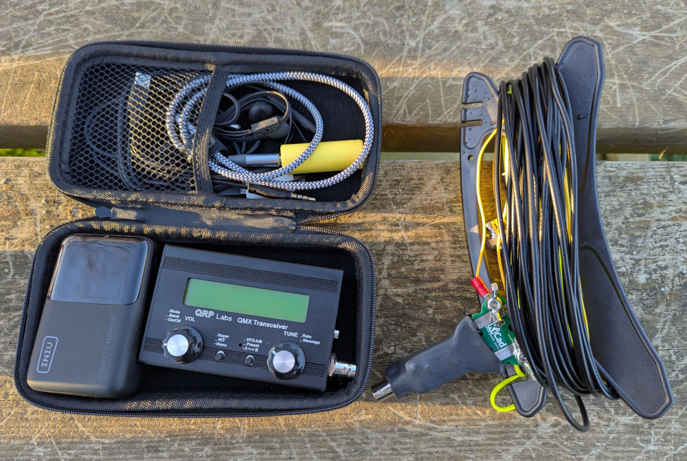 Complete kit with QMX, battery, mic and cables in a small case, antenna and coax on a winder