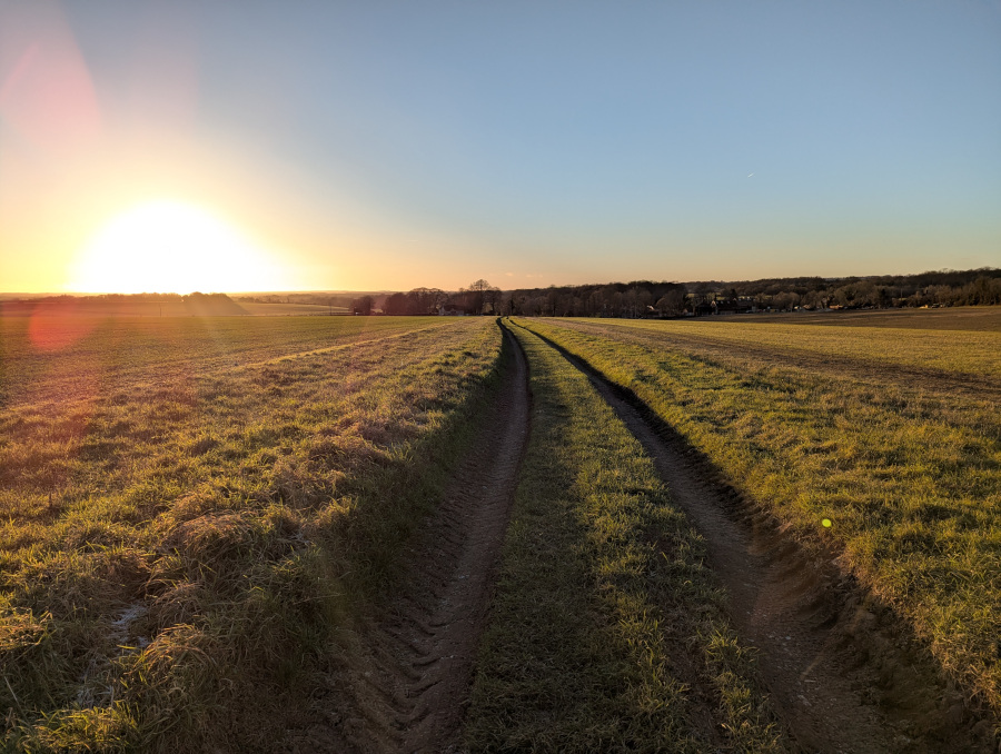 Sun setting over the fields