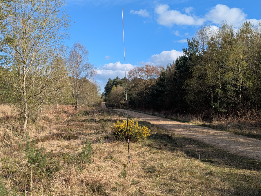 Antenna set up beside a path