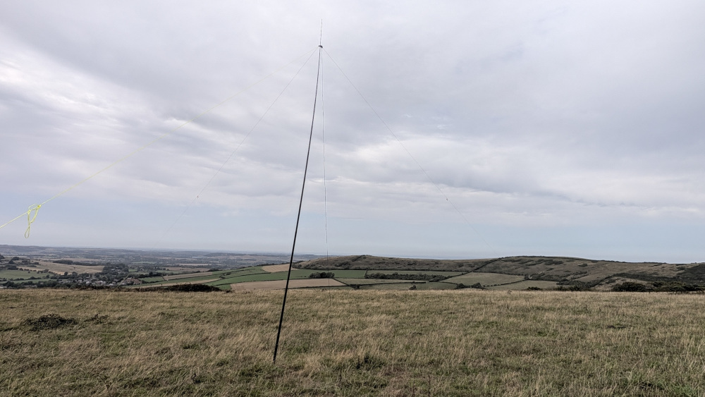 Inverted V dipole antenna with a view over downland