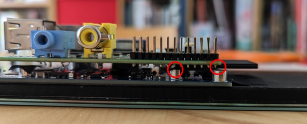 The Pi mounted to the screen, showing points of accidental contact