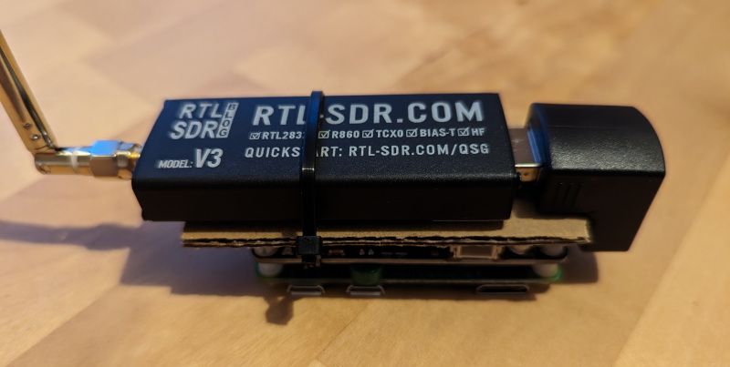 A Raspberry Pi Zero W, USB pHAT and RTL-SDR dongle attached together