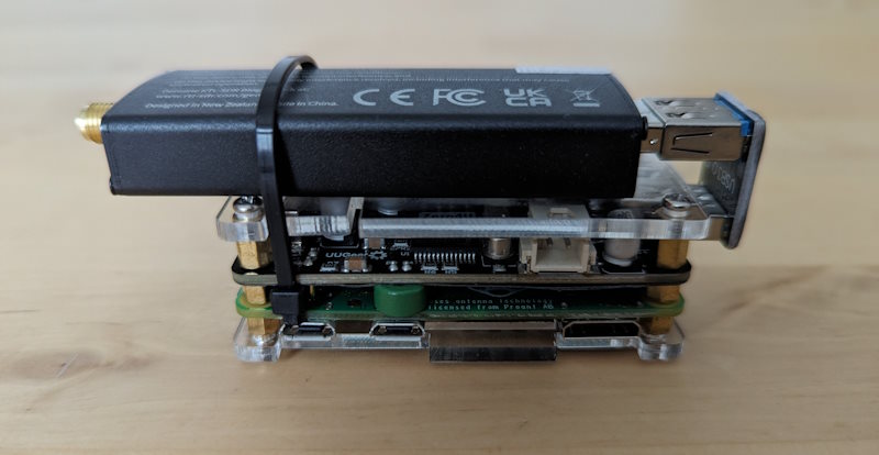 A Raspberry Pi Zero W, USB pHAT and RTL-SDR dongle attached together