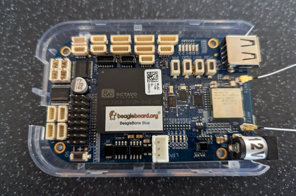 Beaglebone Blue board in the bottom half of a case